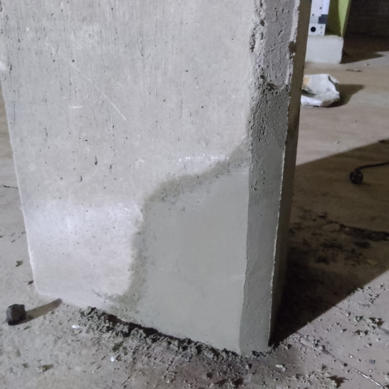 Finished patch repair to the corner of a basement column