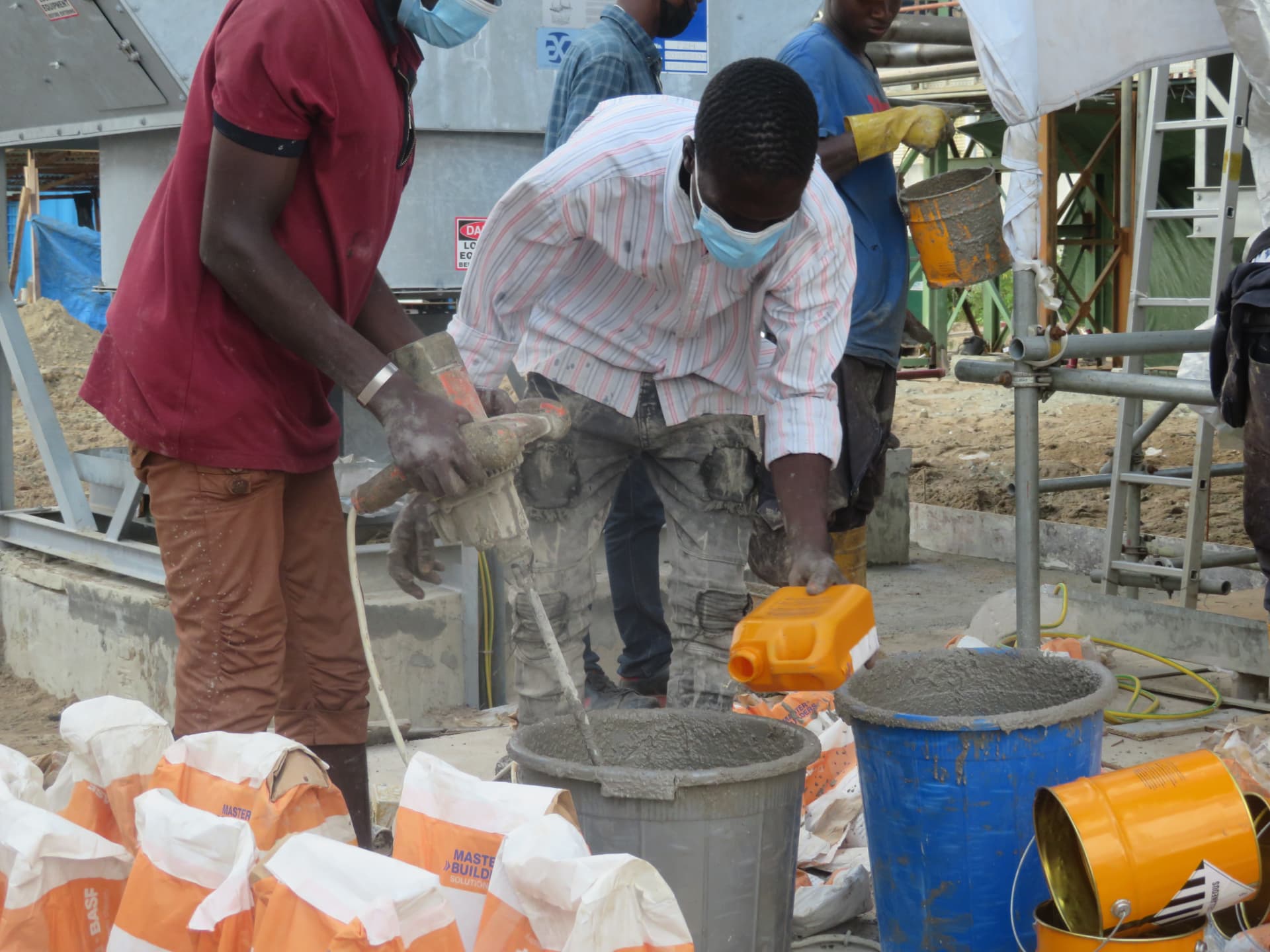 Operatives mixing MasterFlow non-shrink grout on site