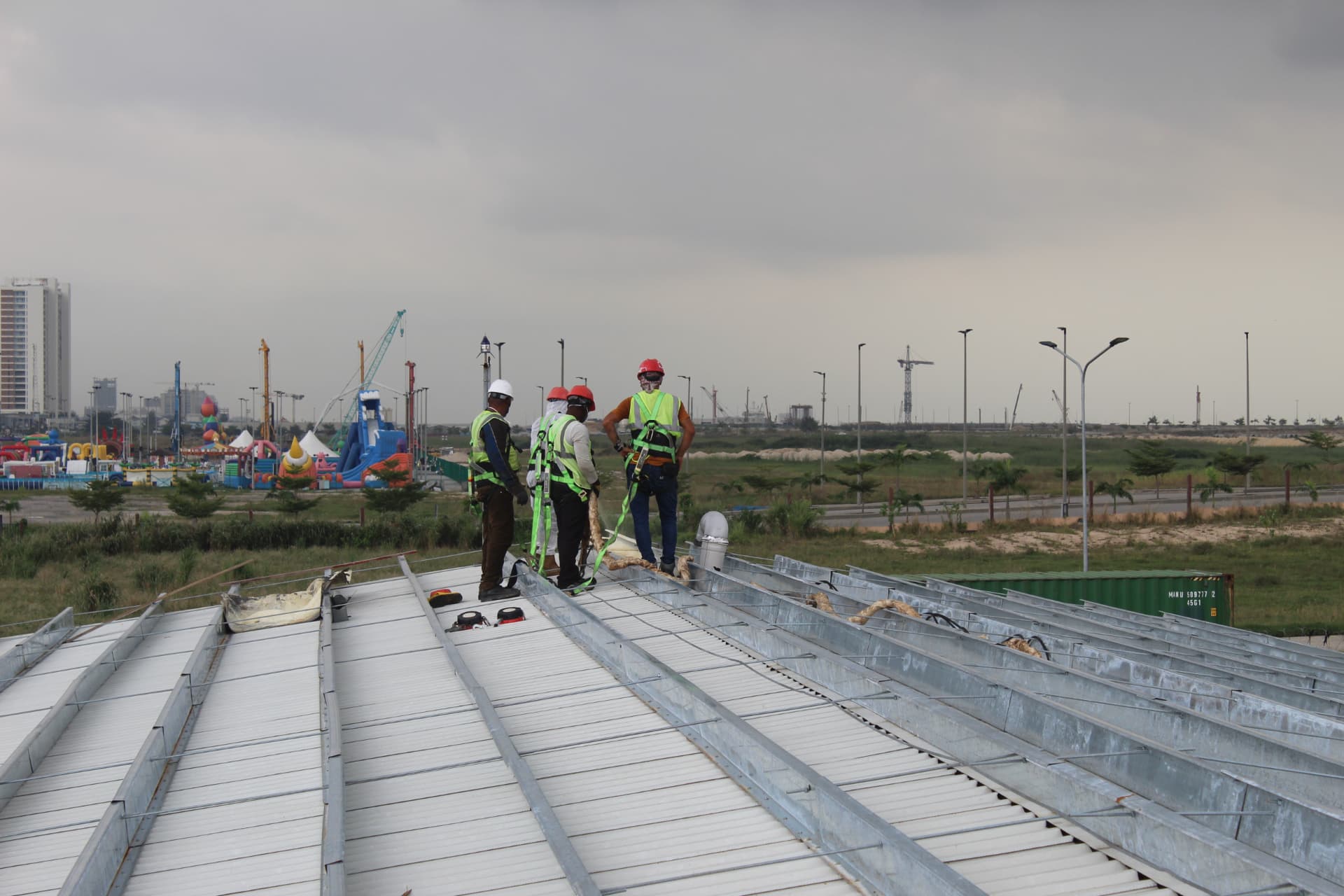 Site team on the roof reviewing the insulation sequence
