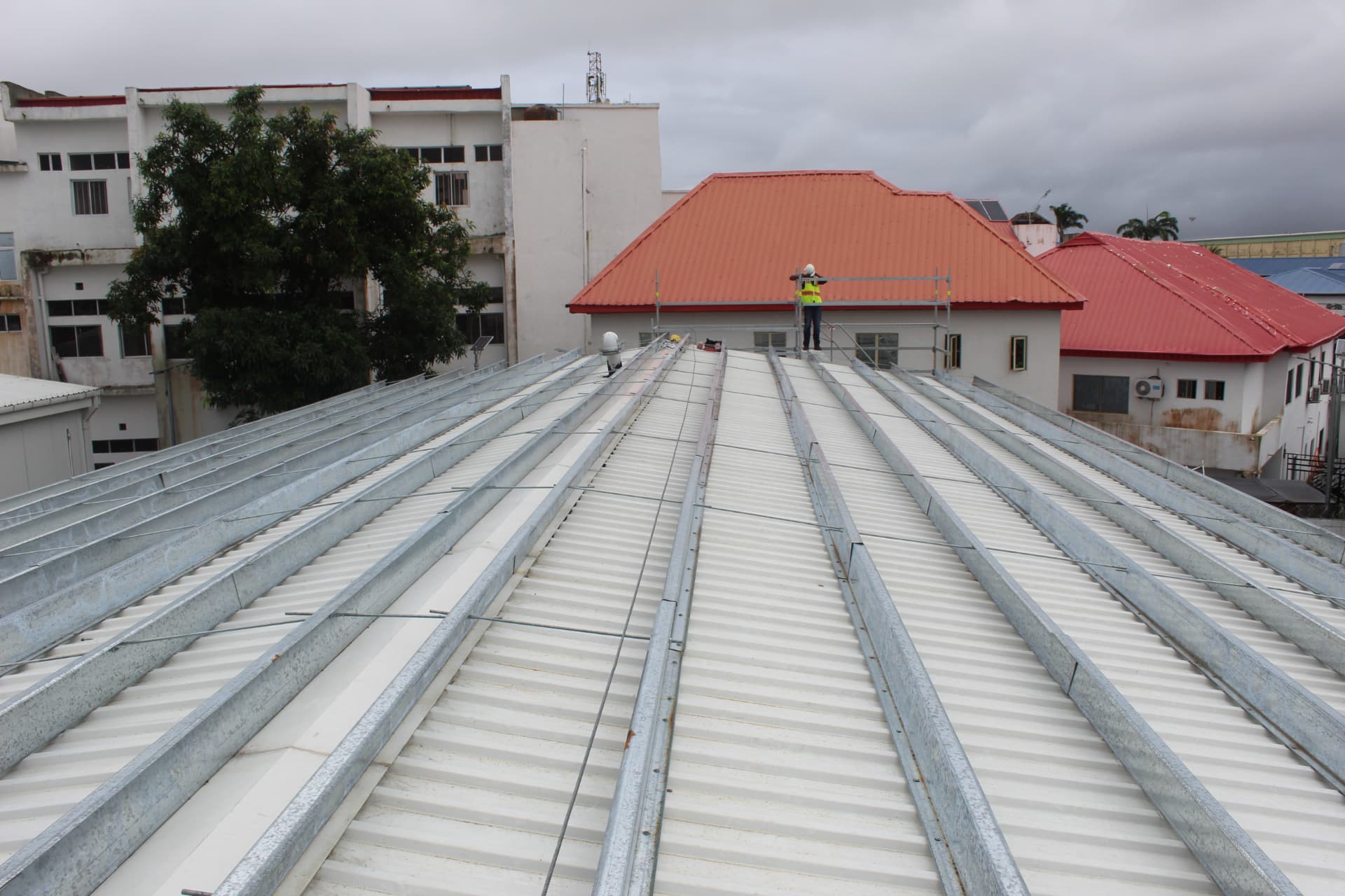 Prepared metal roof and support rails before foam application