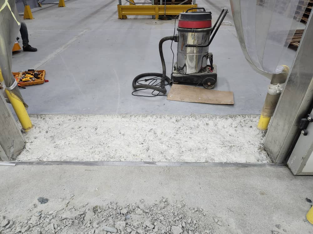 Breakout of the failed joint strip along the door line