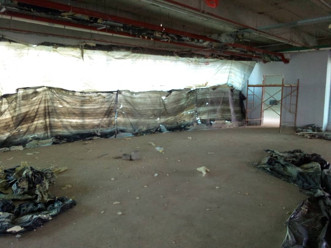 Work area screened off with sheeting during the insulation installation